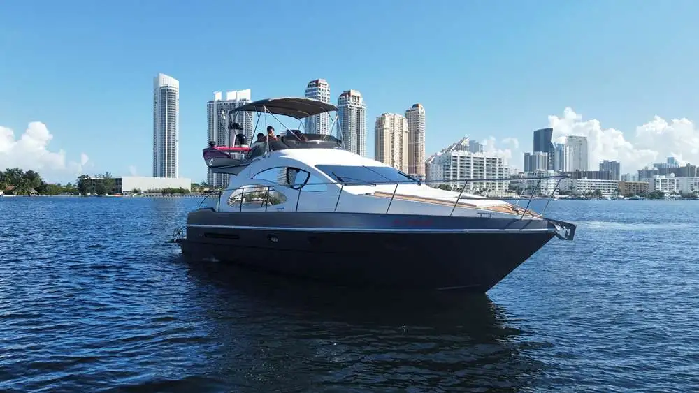 Rodman 110 from Enjoy, anchored at sunset in front of Miami (Florida).