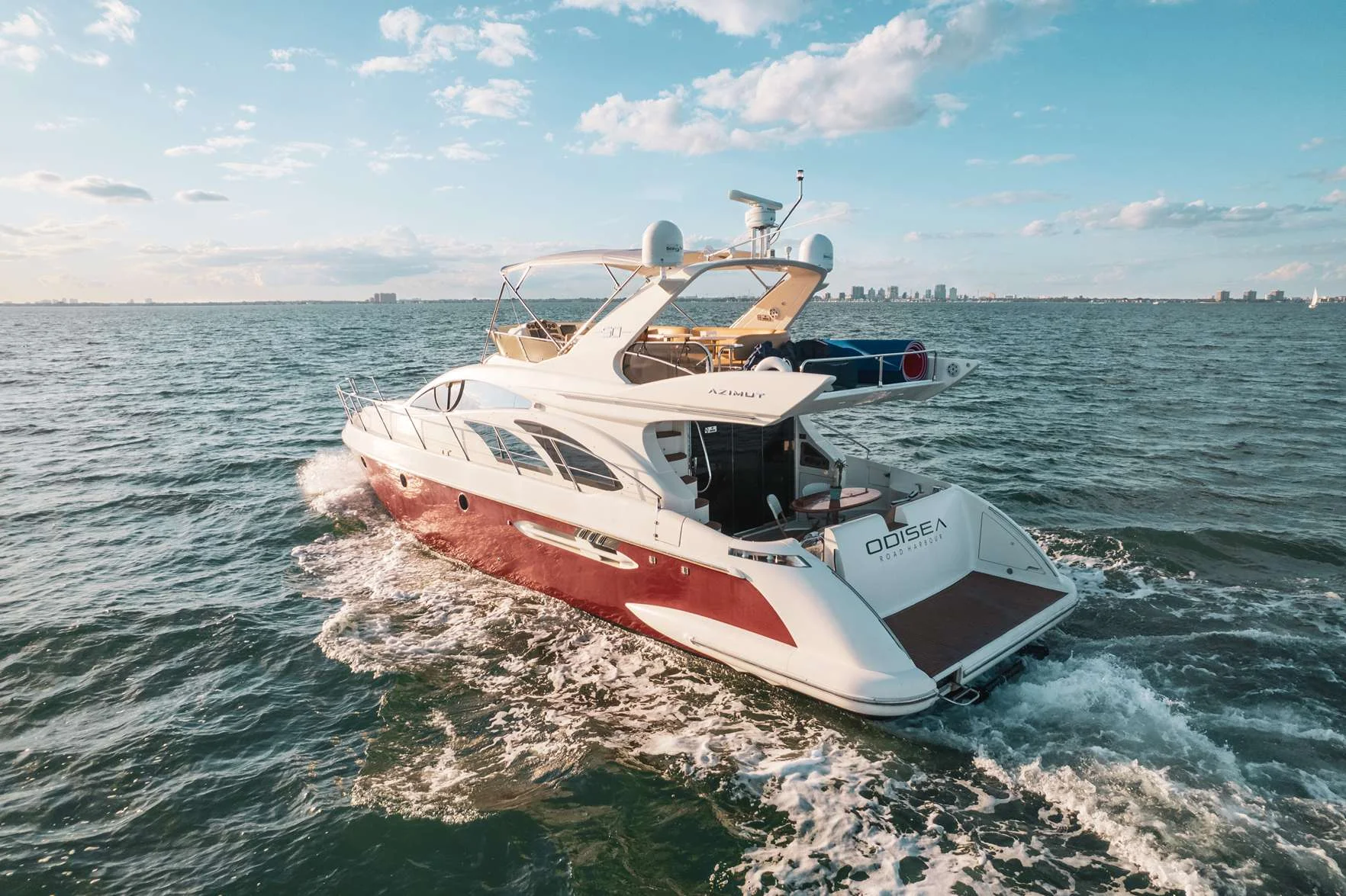 Azimut 50 Odisea from Enjoy, sailing on the sea near Miami Beach.